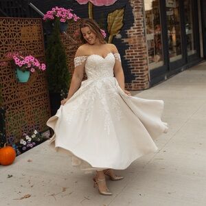 Elegant Cream Off-Shoulder Wedding Dress
